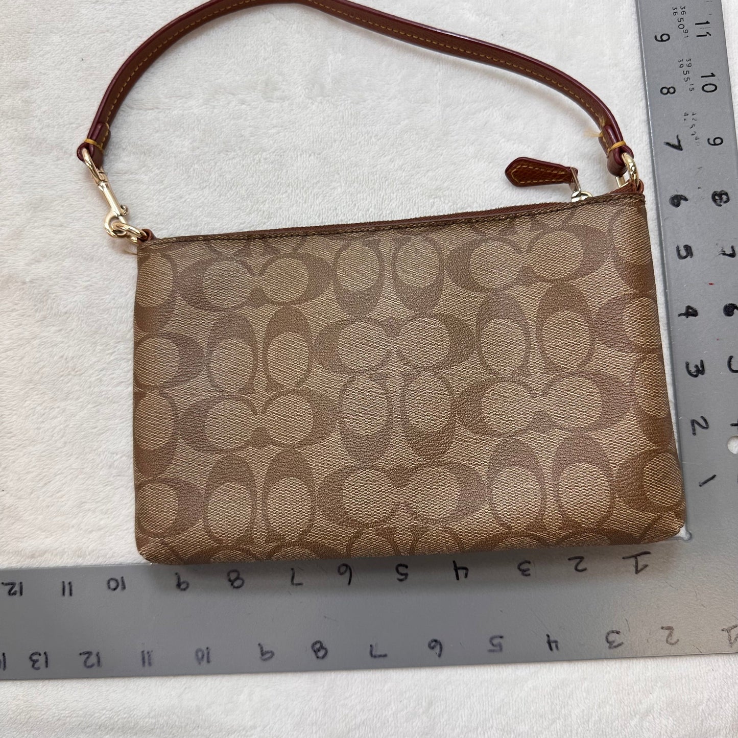 Clutch Designer By Coach, Size: Small