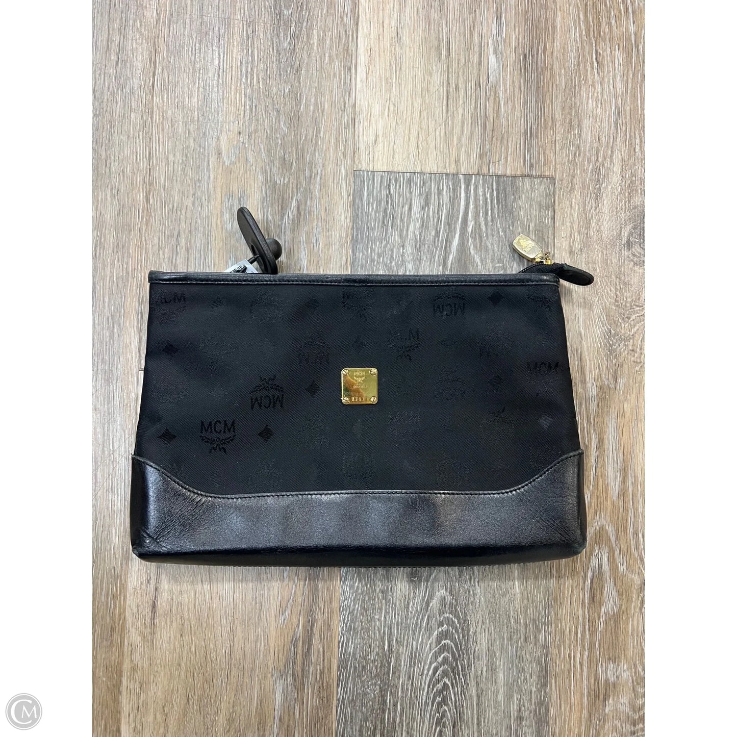 Clutch Luxury Designer By Mcm, Size: Medium
