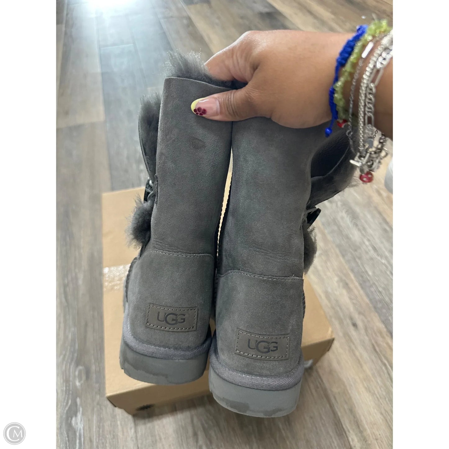 Boots Designer By Ugg In Grey, Size: 9