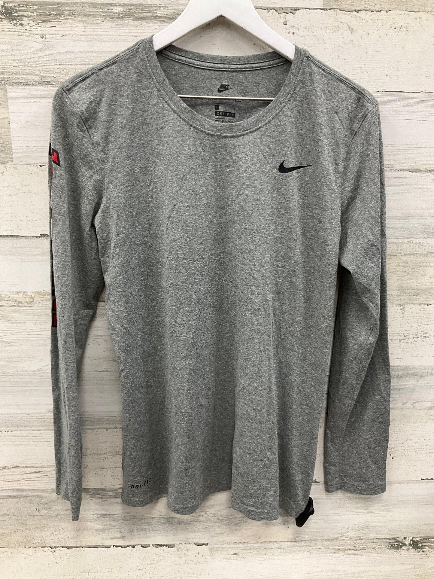 Athletic Top Long Sleeve Crewneck By Nike In Grey, Size: L