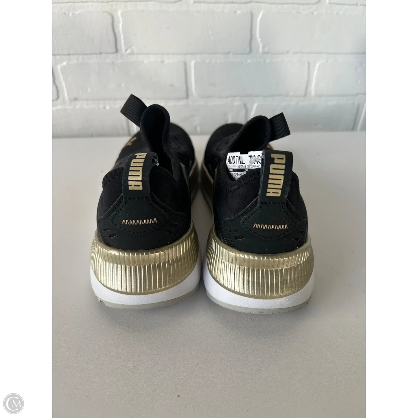 Shoes Sneakers By Puma In Black & Gold, Size: 8